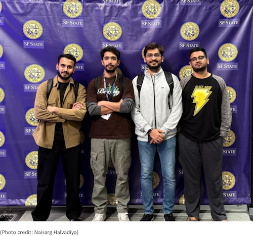 Four students who competed in 2025 SF Hacks, standing in front of SFSU-logo backdrop