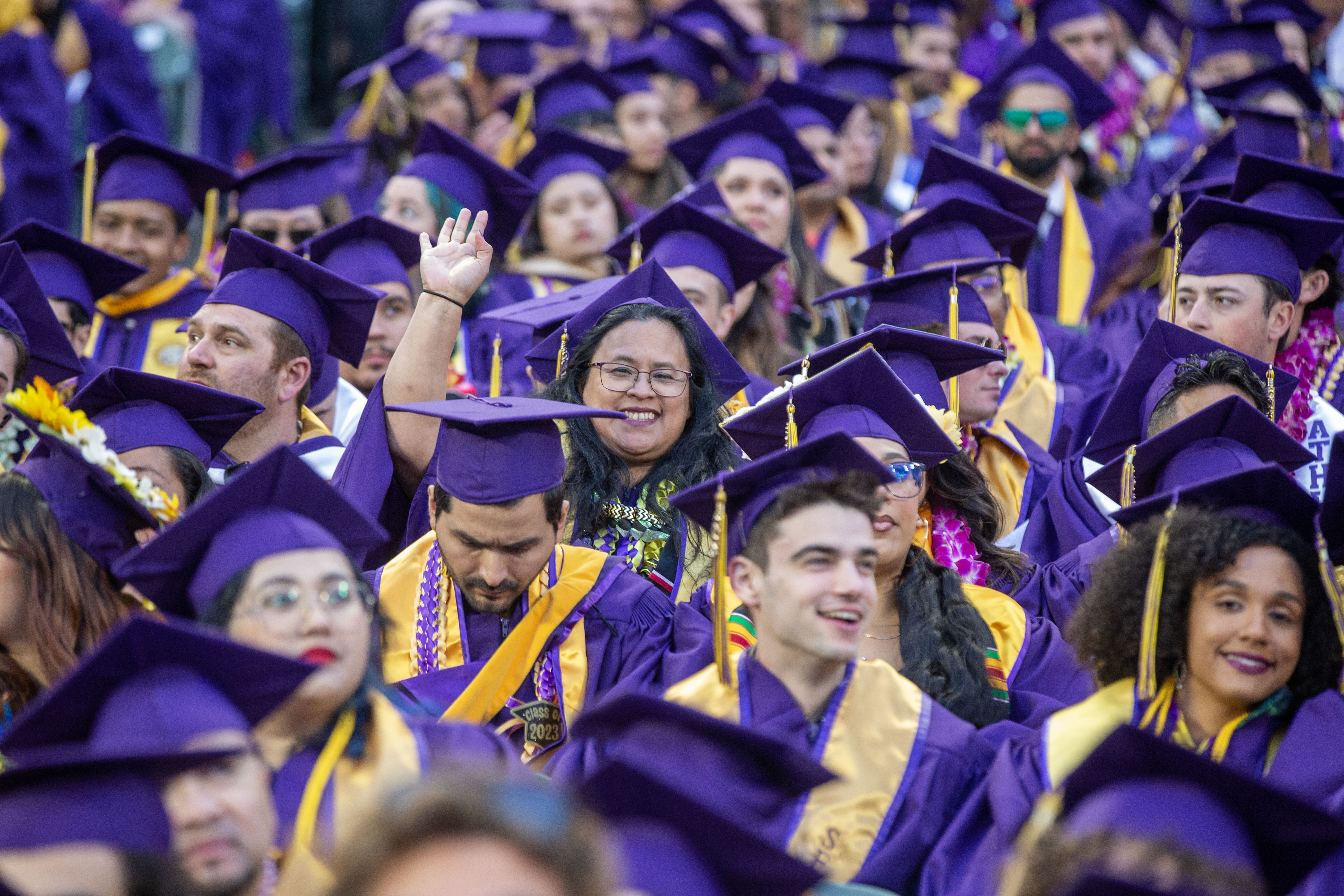Graduates in caps and gowns at commencement celebration