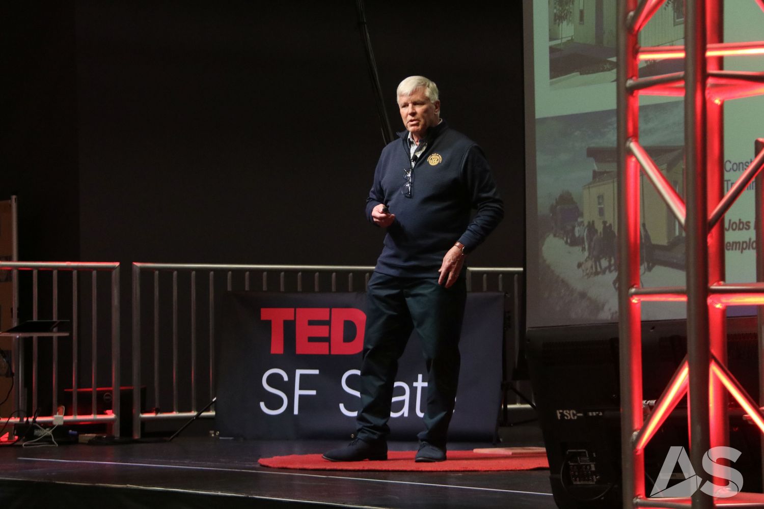Eric Johnsen is giving a speech at the TEDxSF State Event 