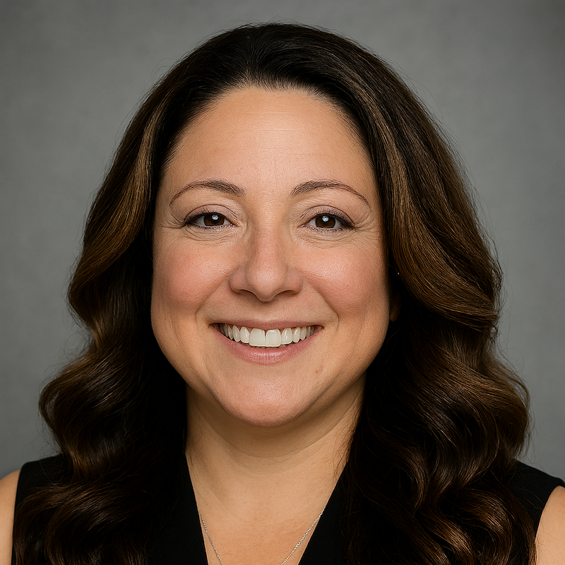 Melissa Palwick, woman smiling with brown hair wearing sleeveless top