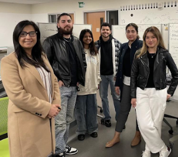 SFSU students standing in a classroom, who are on a competition team for the 2024 NASA MITTC