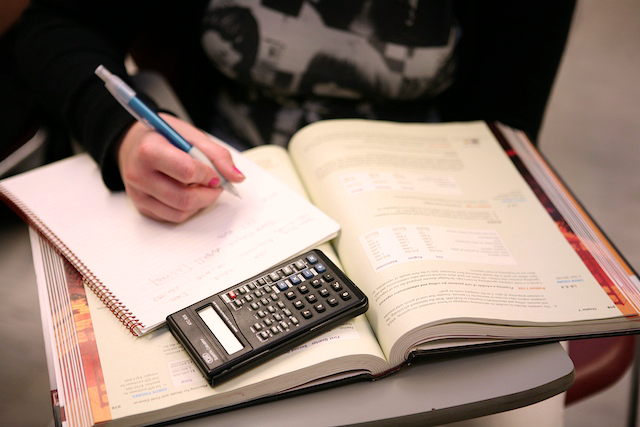 finance book and calculator