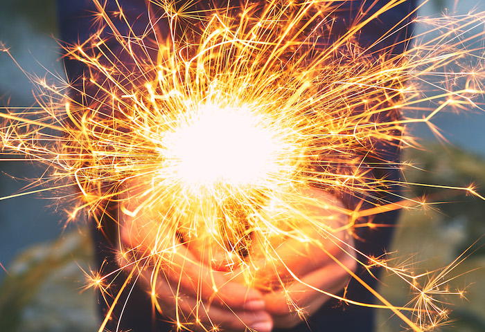 woman holding sparkler